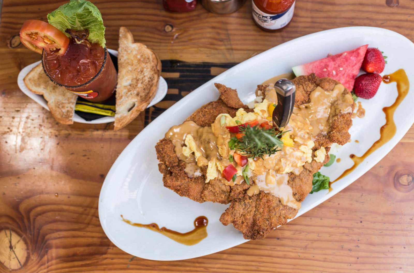 fried chicken with gravy and bloody mary